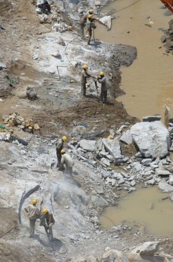 Hyderabad India şantiyesinde çalışanlar.