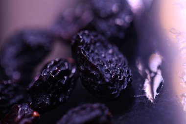 Kurutulmuş Black Raisins Macro shot 'ı