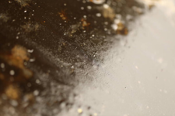 Wet Tar Road Texture Close-up