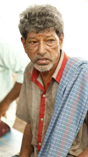 stock image Old Age Fishermen in a beach Vizag India 20th Jun 2024