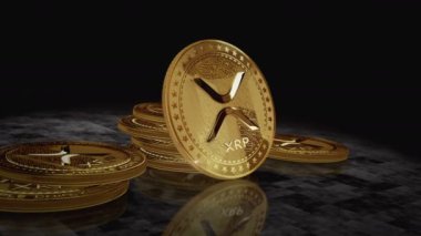 Dalgalanan XRP kripto altın sikke dönüşü. Kamera 3 boyutlu metal parlaklıklar etrafında döner. Fintech, çevrimiçi ödeme ve dijital işlem soyut kavramı.