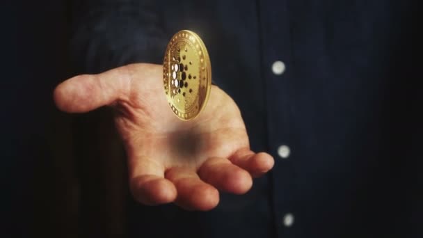 Cardano Ada Cryptocurrency Rotating Coin Hovers Hand Businessman Symbol Floating — Vídeo de stock