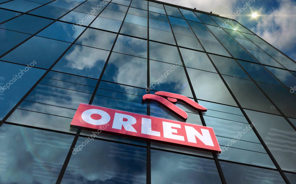 Plock, Poland, January 5, 2023: PKN Orlen headquarters glass building concept. Polish petrol oil gas and energy company symbol on front facade 3d illustration.