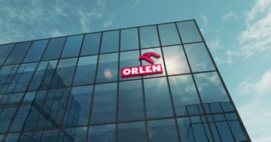 Plock, Poland, January 5, 2023: PKN Orlen headquarters glass building concept. Polish petrol oil gas and energy company symbol on front facade 3d animation.