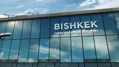 Plane landing at Bishkek, Kyrgyzstan 3D. Arrival in the city with the glass airport terminal and reflection of the jet aircraft. Travel, business, tourism and transport 3D concept.