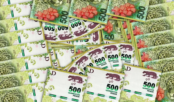Argentina Peso banknotes in a cash fan mosaic pattern. Argentine 500 ARS notes. Abstract concept of bank, finance, economy decorative design background 3d illustration.