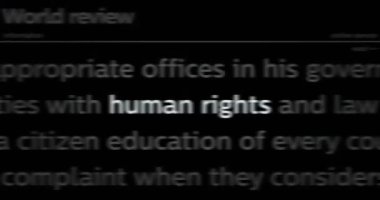 Human rights fight for freedom and justice headline news across international media. Abstract concept of news titles on noise displays loop. TV glitch effect seamless and looped.