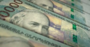 Ermenistan parası Ermeni Dram banknot döngüsü. AMD para dokusu. Ekonomi, iş, kriz, bankacılık, durgunluk, borç ve finans kavramı. Notayı kaydırıyorum. Döngüsüz 3D canlandırma.