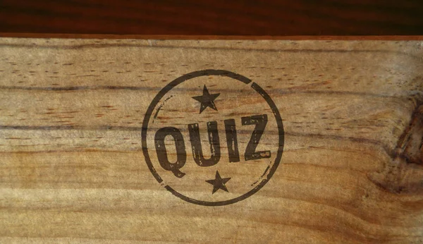 stock image Quiz stamp printed on wooden box. Competition question and answer knowledge game concept.