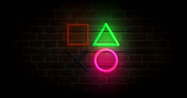 stock video Joystick icons neon symbol on brick wall. Esport video game controller symbol  light color bulbs. Loopable and seamless abstract concept animation.