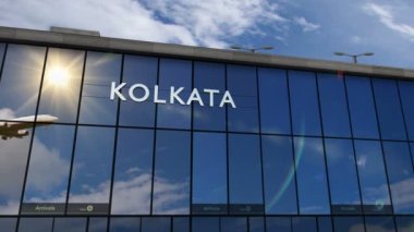 Kolkata, Hindistan 'a 3 boyutlu bir uçak iniyor. Cam havaalanı terminali ve jet uçağının yansımasıyla şehre vardık. Seyahat, iş, turizm ve ulaşım 3D konsepti.