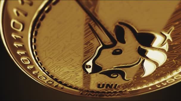 Uniswap Uni暗号通貨黄金のコインの回転 カメラは3Dメタルグローコインを中心に回転します フィンテック オンライン決済 デジタル取引の抽象的な概念 — ストック動画