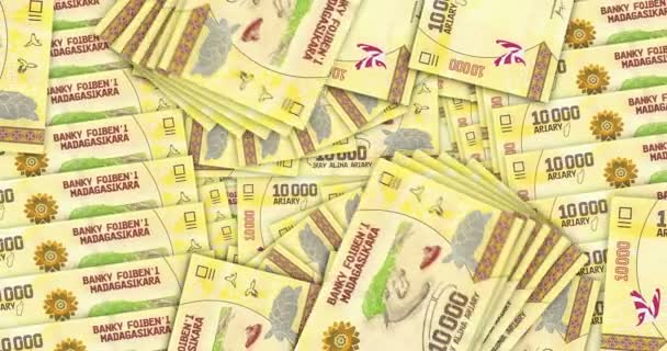 马达加斯加阿里利钞票在现金扇形花纹循环 马达加斯加Mga钞票 经济无缝循环装饰设计背景的抽象概念 — 图库视频影像