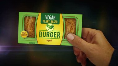 Elinde vejetaryen yeşil organik gıda kutusu var. Vejetaryen hamburger, çevre dostu yemek paketi. Soyut kavram 3D canlandırma canlandırması.