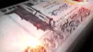 Libya parası Libya Dinarı para sayımı. LYD banknotları. Hızlı para sayım makro döngüsü. İş, finans ve ekonomi. Döngüsüz ve pürüzsüz bir kavram.