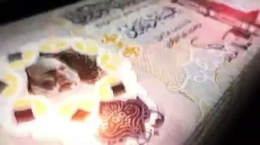 Libya parası Libya Dinarı para sayımı. LYD banknotları. Hızlı para sayım makro döngüsü. İş, finans ve ekonomi. Döngüsüz ve pürüzsüz bir kavram.