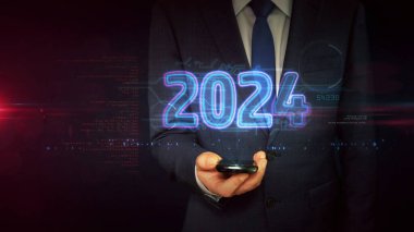 2024 yeni siber tasarım konsepti. İş adamı elindeki holograma dokunuyor. Fütürist ışık neon sembolü soyut 3D illüstrasyon.