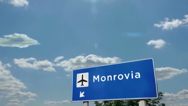 Jetplan Landar Monrovia Liberia Planet Stad Ankomst Med Flygplats Riktningsskylt — Stockvideo