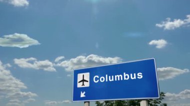 Columbus Ohio, ABD Jet uçağı iniyor. Havaalanı istikameti işaretli şehir gelişi. Seyahat, iş, turizm ve uçak taşımacılığı kavramı.