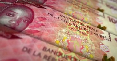 Gine parası Gine frangı banknot döngüsü. GNF 10000 para dokusu. Ekonomi, iş, kriz, bankacılık, durgunluk, borç ve finans kavramı. Dikdörtgen 3D nota üzerinde hareket.