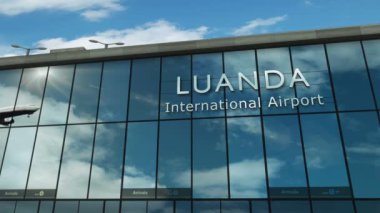Uçak Luanda, Angola 'ya iniyor. Cam havaalanı terminali ve jet uçağının yansımasıyla şehre vardık. Seyahat, iş, turizm ve ulaşım 3D konsepti.