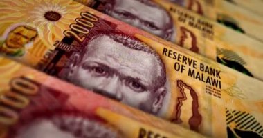 Malavi parası Malawian kwachas banknot döngüsü. 2000 MWK para dokusu. Ekonomi, iş, kriz, bankacılık, durgunluk, borç ve finans kavramı. Dikdörtgen 3D nota üzerinde hareket.