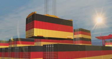 Almanya, kargo vinçlerini ihraç edip ithal ediyor. Bir Almanya bayrağıyla taşımacılık, yükleme ve taşımacılık.