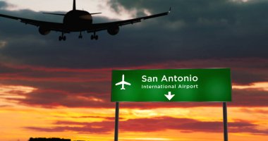Uçak silueti San Antonio, Teksas, ABD 'ye iniyor. Havaalanı yön tabelasıyla ve arka planda gün batımıyla şehre vardık. Trip ve ulaşım konsepti 3d illüstrasyon.