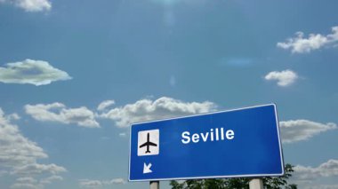 Sevilla İspanya Jet uçağı iniyor. Havaalanı istikameti işaretli şehir gelişi. Seyahat, iş, turizm ve uçak taşımacılığı kavramı.