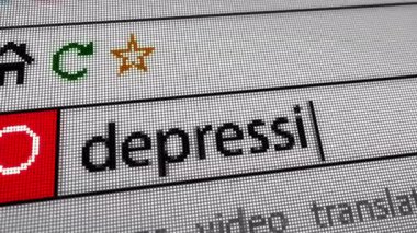 Depresyon ve zihinsel sağlık krizi metni tarayıcı ekranında yazılıyor. Monitör piksel görünümü olan internet aranıyor.