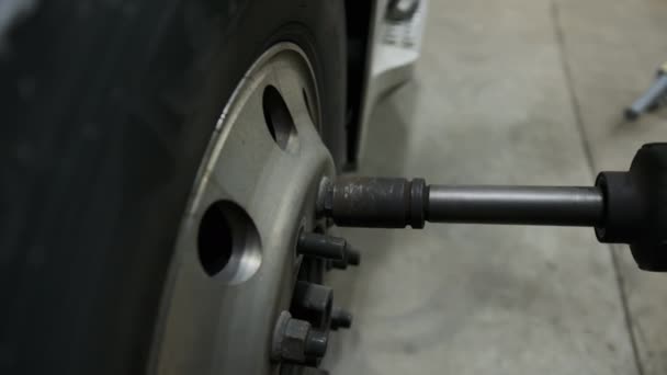 Worker Makes Repair Wrench Wheel Tire Truck Closeup Using Tool — Stock Video