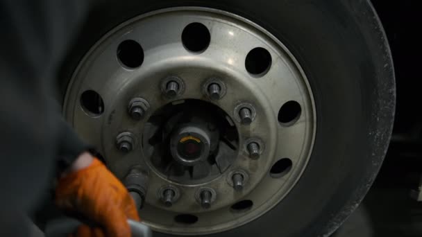 Worker Makes Repair Wrench Wheel Tire Truck Closeup Using Tool — Stock Video