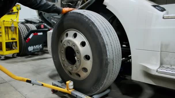 Worker Makes Repair Wheel Tire Truck Closeup Using Tool High — Stock Video
