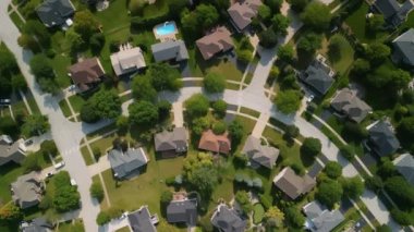 Drone view of american suburb at summertime. Establishing shot of neighborhood. . High quality 4k footage
