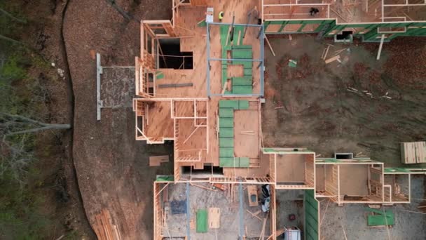 Aerial View New House Construction Wood Framing Beams Sunny Day — Stock Video