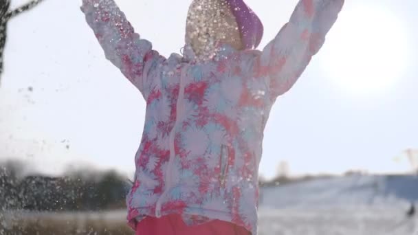Funny Little Girl Throws Snow Happy Children Play Snowballs High — Stock Video