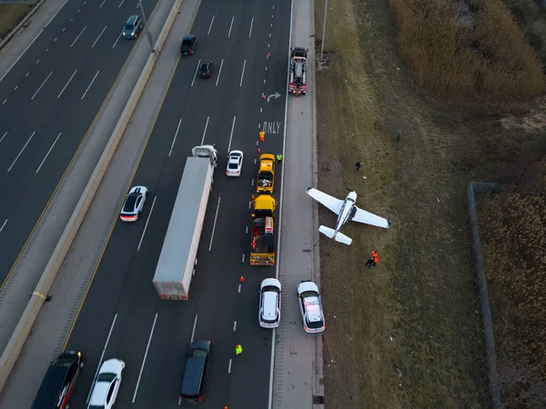 Emergency airplane landing on highway. Drone shot. High quality photo