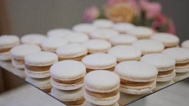 Beautiful, bright buffet with many sweet snacks, a candy bar, is waiting for guests at the celebration. . High quality 4k footage