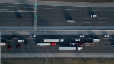 Aerial Drone Flight top down View of busy city rush hour heavy traffic jam highway. . High quality 4k footage