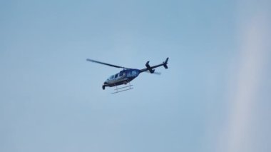 News helicopter hovering over crime scenes for the news. Chicago IL. USA 10 January 2023. High quality 4k footage