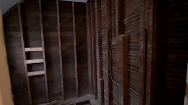 reconstruction of an old house. replacement of old wooden beams. High quality 4k footage