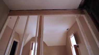 reconstruction of an old house. replacement of old wooden beams. High quality 4k footage