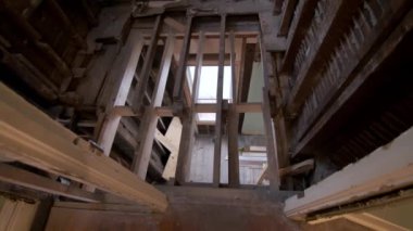 reconstruction of an old house. replacement of old wooden beams. High quality 4k footage