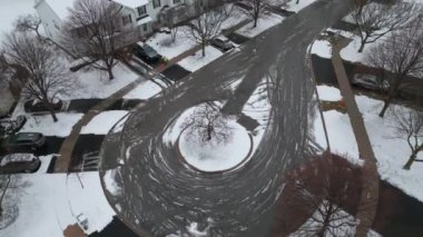 Snow blower clear pavement near flat house and car parking in early winter morning. . High quality 4k footage
