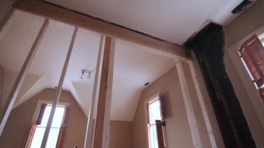 reconstruction of an old house. replacement of old wooden beams. High quality 4k footage