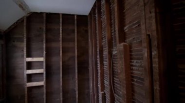 reconstruction of an old house. replacement of old wooden beams. High quality 4k footage