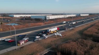 Emergency airplane landing on highway. Drone shot. High quality photo