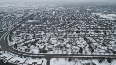panoramic aerial view of a winter Naperville city with a private sector . High quality 4k footage