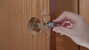 Repair of broken doors, replacement of door handles. High quality 4k footage