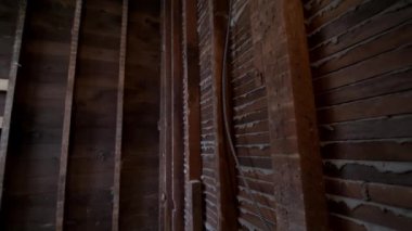 reconstruction of an old house. replacement of old wooden beams. High quality 4k footage